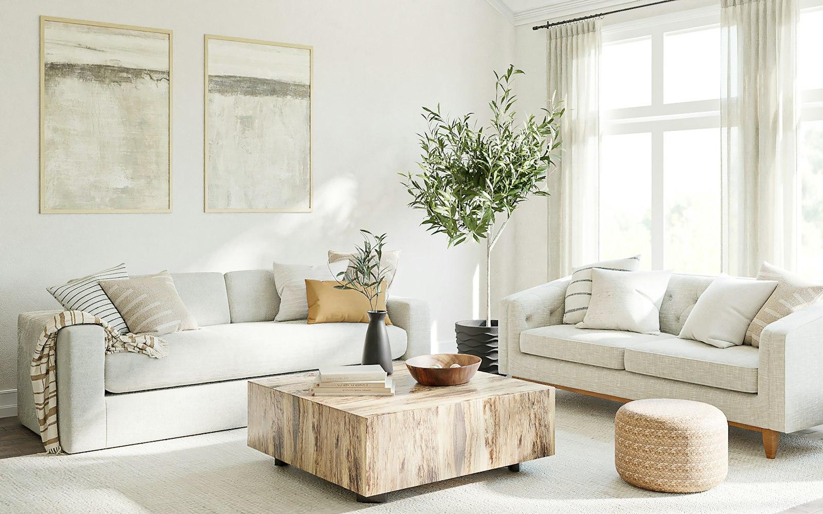 A bright, spotless living room with white furnishings.